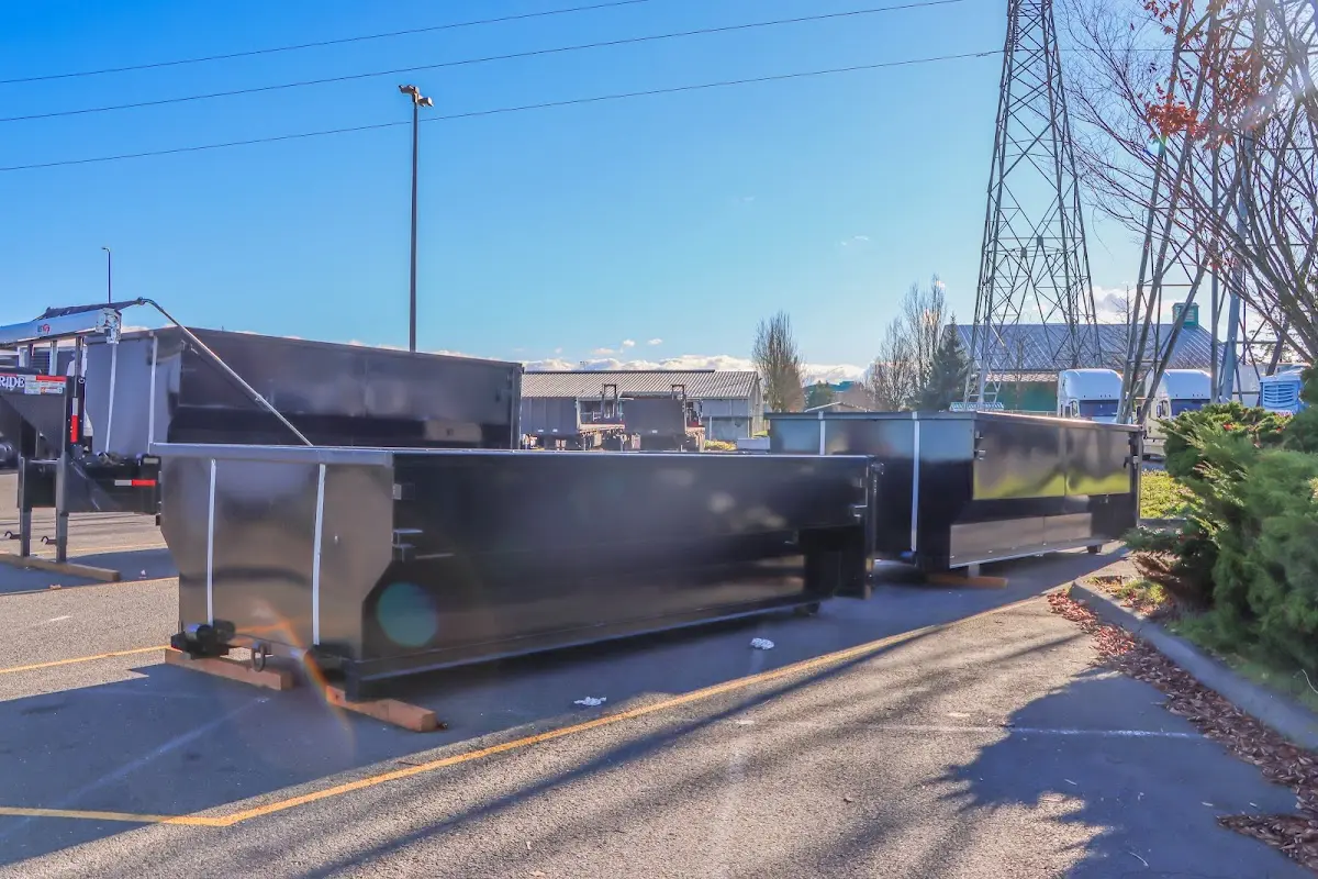 Roll-off dumpster ready for waste disposal at job site for 4 Yard Dumpster Rental in Stanford
